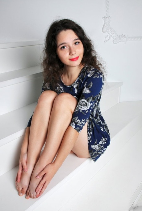 Beautiful brunette teen sports red lips while baring her great body