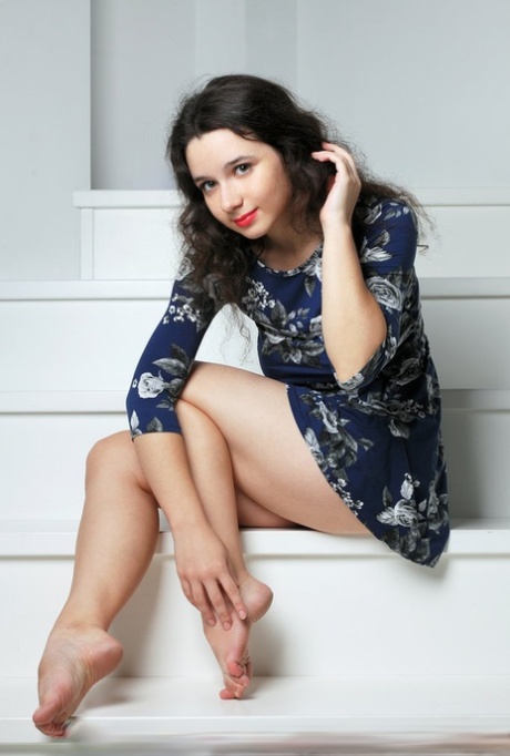 Beautiful brunette teen sports red lips while baring her great body