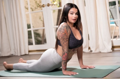Three big bottomed females do yoga in their workout clothes