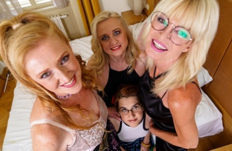 Mature blondes have a lesbian foursome with a young redheaded girl