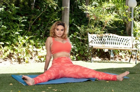 Latina chick Crystal Chase uncovers her big tits while going nude during yoga