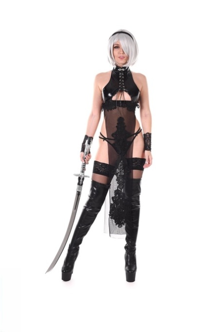 Hot platinum blonde Sia Siberia wields a sword while masturbating with a toy