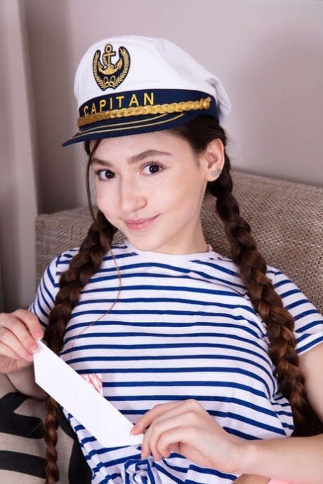 Adorable teen Fendi sports a captain's hat while getting naked in pigtails