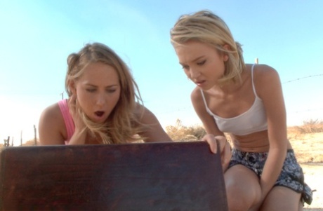 Young blondes get tied up before lesbian and anal sex with a cumshot finale