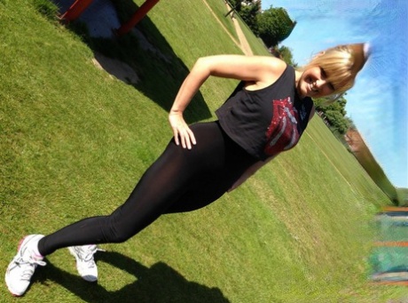 Fitness freak Daniella makes sure everyone notices her ass while exercising