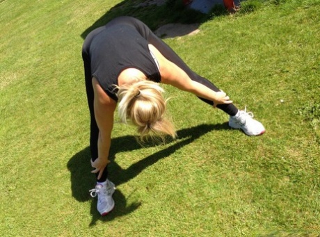 Fitness freak Daniella makes sure everyone notices her ass while exercising