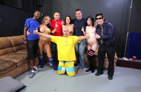 Group of male and female pornstars get together for group sex