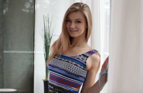Non nude blonde Patritcy A slips off tight dress to display naked teen body