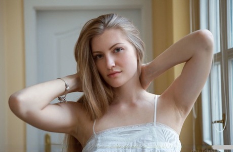 Clothed Euro babe unveiling phat teen ass during glamour photo spread