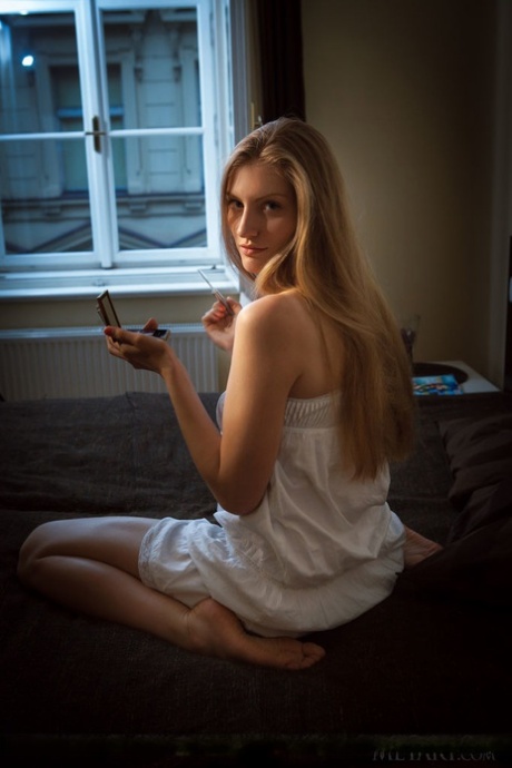 Clothed Euro babe unveiling phat teen ass during glamour photo spread