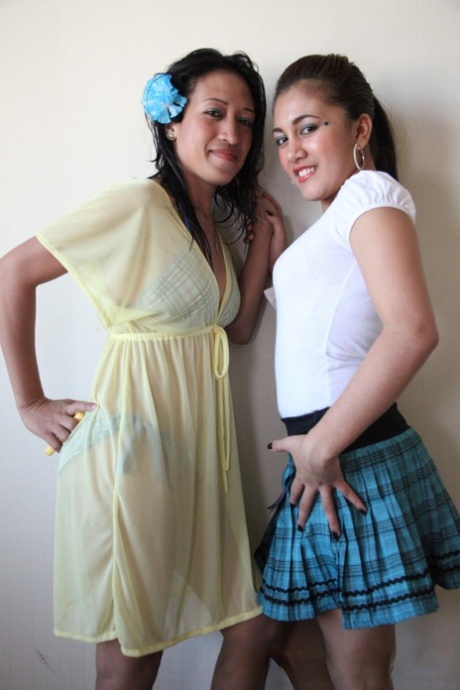 Filipina first timers Jill and Ashley share a lesbian kiss in the nude