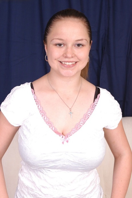 Sexy amateur teen babe strips to show her huge boobs and hairy pussy