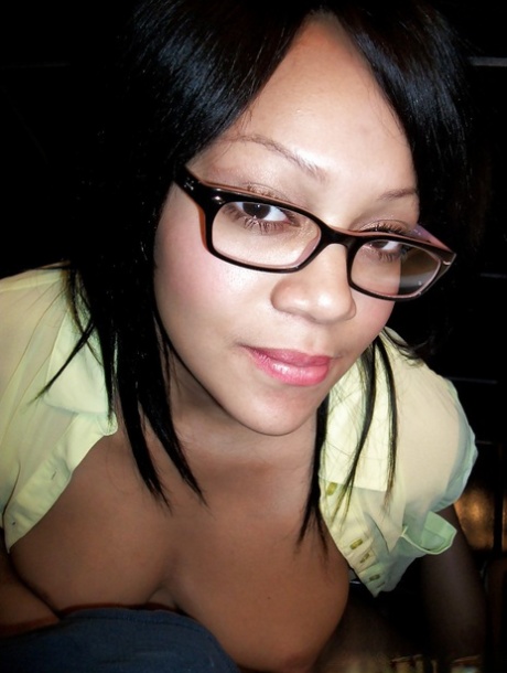 Ebony teen babe Krista Fox hides something between her long legs