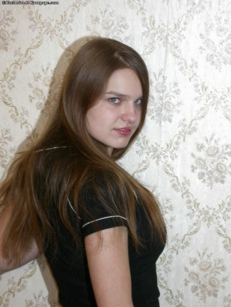 Teen babe with brunette hair Ella is showing her amateur body