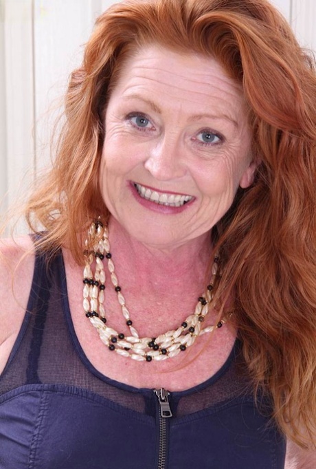 Awesome mature redhead in stockings Veronica showing her ass