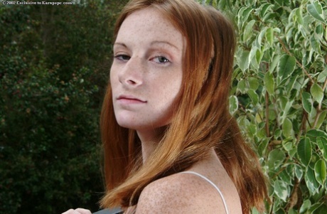 Pretty redhead babe teen Allison spreading her tight pussy