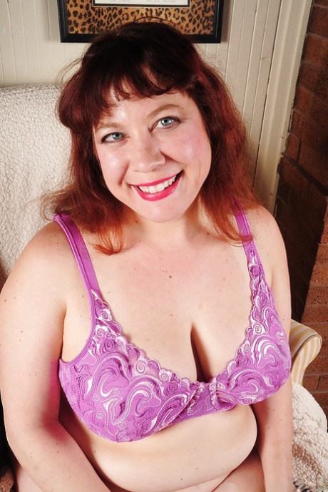 Mature slut with a chubby body Rubee is undressing her pink underwear