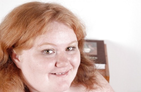Very fat woman Ruby is getting naked and playing with her wide hole