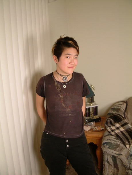 Amateur Asian chick Cady removes sexy boots and bares hairy cooter