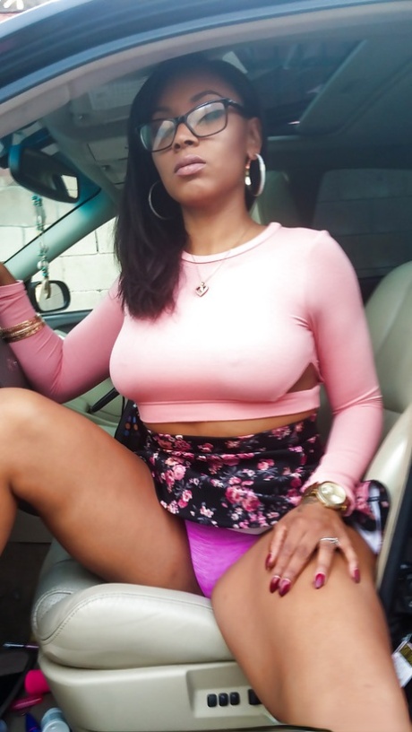 Busty black girl Porsha Carrera bends over in high heels for upskirt
