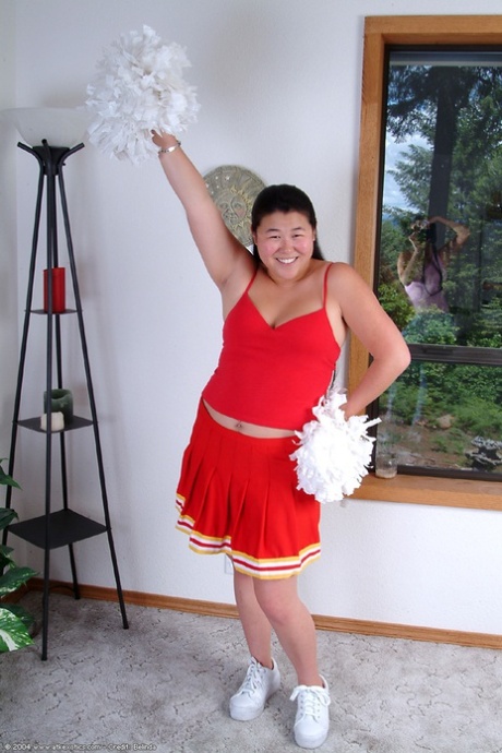 Overweight Asian amateur sliding underwear over to expose hairy vagina