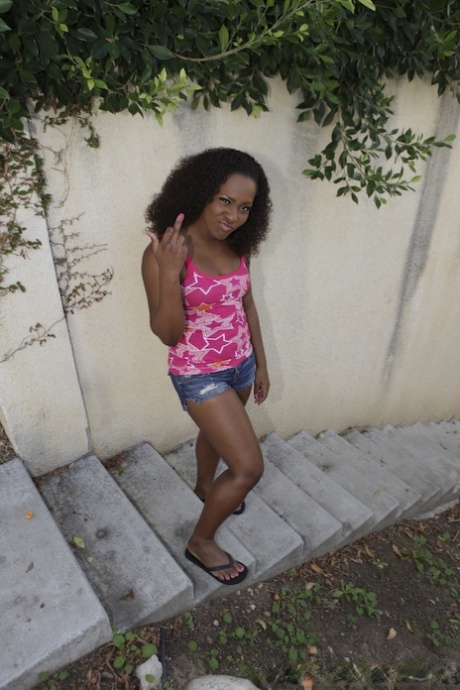 Black girl slips out of shorts and exposes her fabuous ass