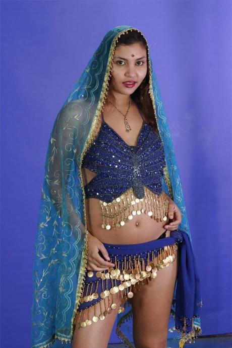 Sexy indian babe on high heels slowly uncovering her tempting curves