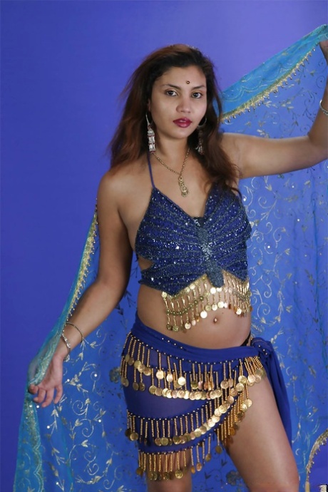 Sexy indian babe on high heels slowly uncovering her tempting curves