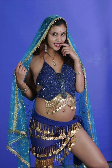 Sexy indian babe on high heels slowly uncovering her tempting curves