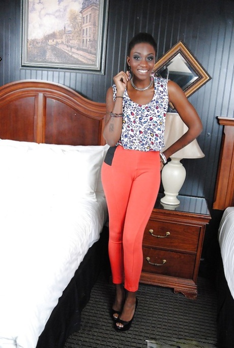 Pretty ebony teen with amazing ass Jayla Dream stripping on the bed