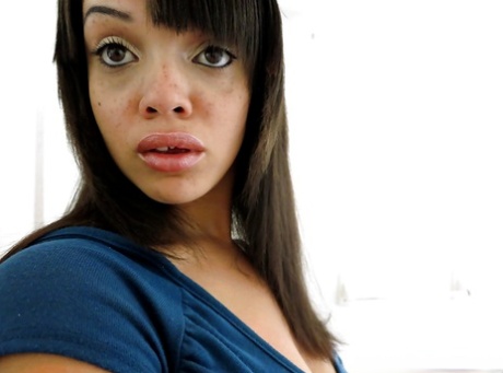 Bosomy ebony amateur Stacey Foxxx getting naked and picturing herself
