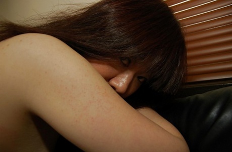 Chubby asian MILF Junko Takeyama posing nude and spreading her lower lips