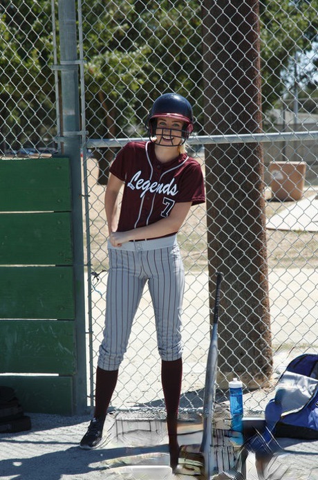 Sporty blonde Morgan Attwood flashing tiny tits & hot ass in a softball field