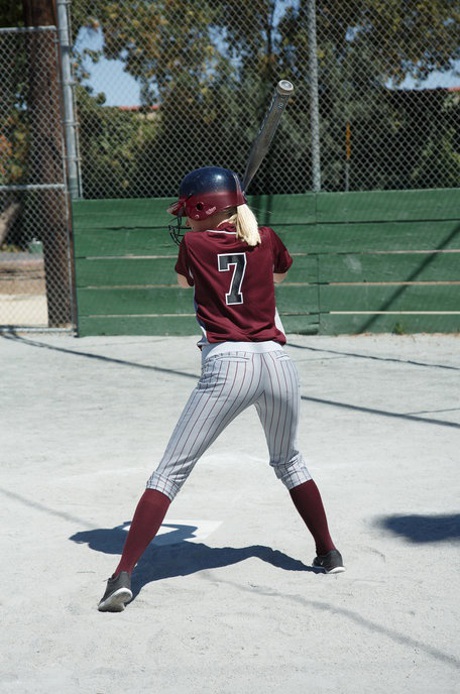 Sporty blonde Morgan Attwood flashing tiny tits & hot ass in a softball field