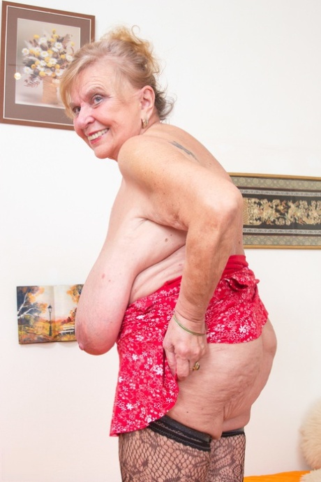 Old fat granny Darla revelas her huge tits and masturbates in a solo