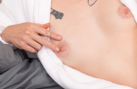 Sexy mom Roxanne shows off her sweet hairy pussy up close on her bed