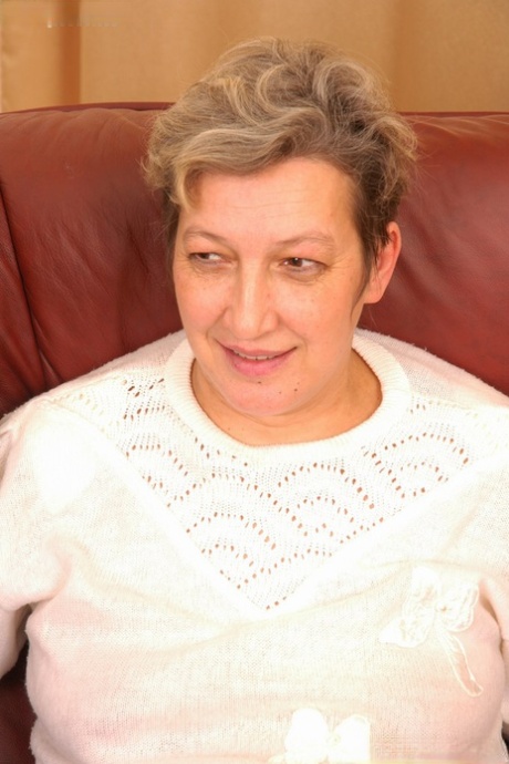Chubby granny Inga gives a blowjob before getting rammed in a threesome