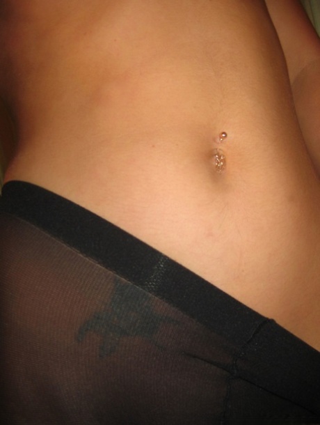 Amateur with pierced nipple Veranika teases with her body in sexy pantyhose