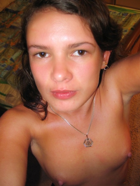 Amateur with pierced nipple Veranika teases with her body in sexy pantyhose