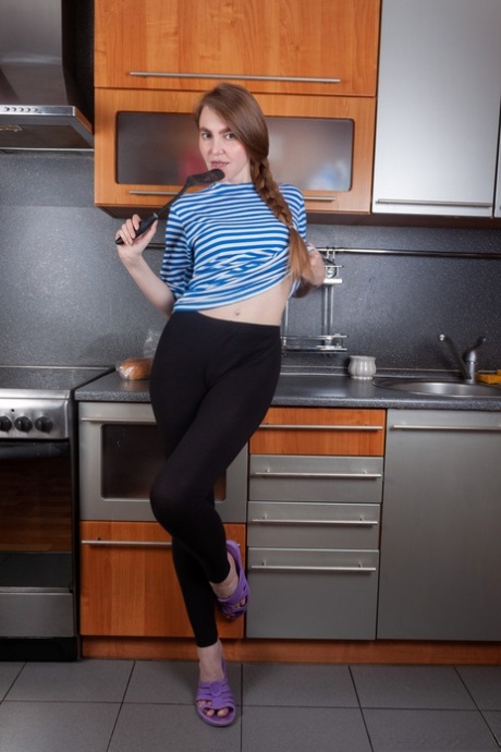 Brunette teen with a big ass Malta masturbates with a kitchen tool
