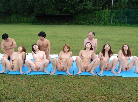 Kinky Asian girls tease with their asses and get rammed in an outdoor session