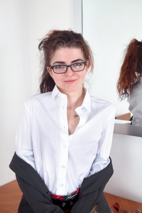 Nerdy British schoolgirl Scarlet Contemptress strips & spreads her hairy clam