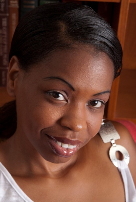 Alluring ebony sweetie Lippz spreads hairy chocolate pussy wide in stockings