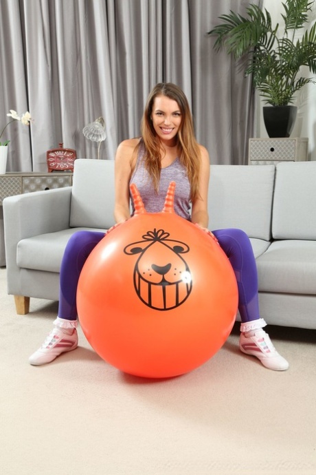 Hottie Dominika K strips and shows her amazing boobs while bouncing on ball