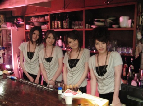 Brunette Japanese waitress Anna Kirishima and her coeds enjoy anal group sex