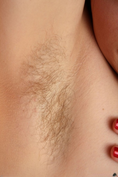 Hot cutie Ruby Roxx with nice round ass reveals hairy armpits & pussy closeup