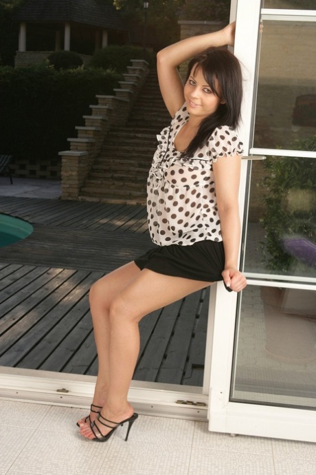Naughty amateur teen Anett strips outdoors & fucks herself with a glass toy