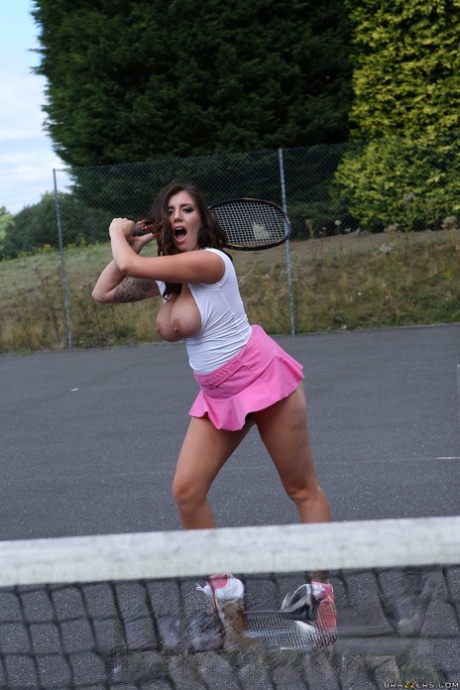 Big titted tennis player Abbie Cat frees fake big tits & flashes naked upskirt