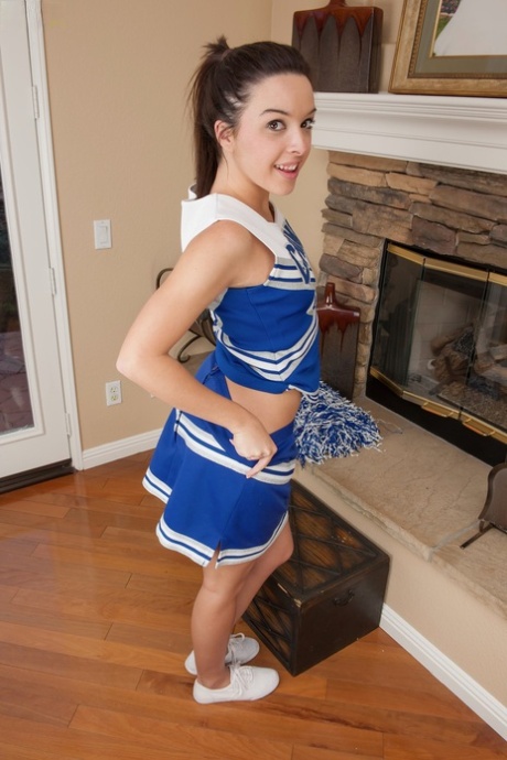 Cheerleader Jaslene Jade shows off her perfect tits & spreads her puffy pussy