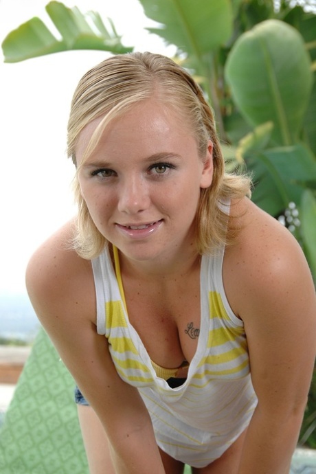 Blonde amateur Tracey Sweet strips poolside & shows her big ass & hairy pussy